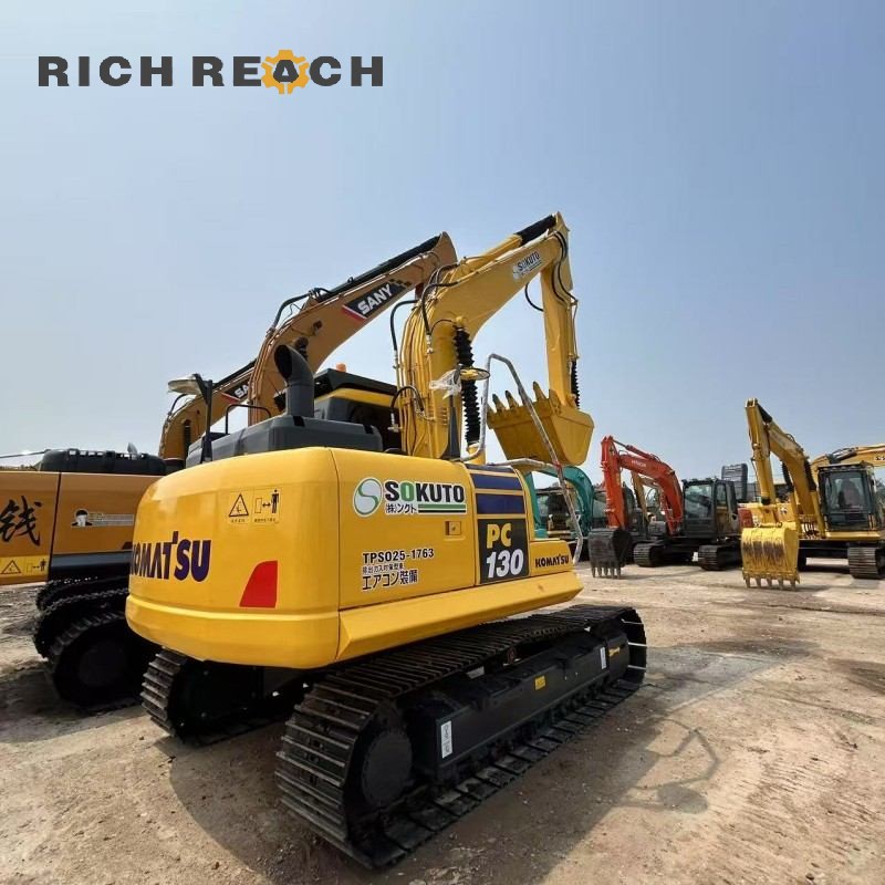 Cab interior and monitor display of a used 2018 Komatsu PC130 excavator for sale at $16,667 from Richreach